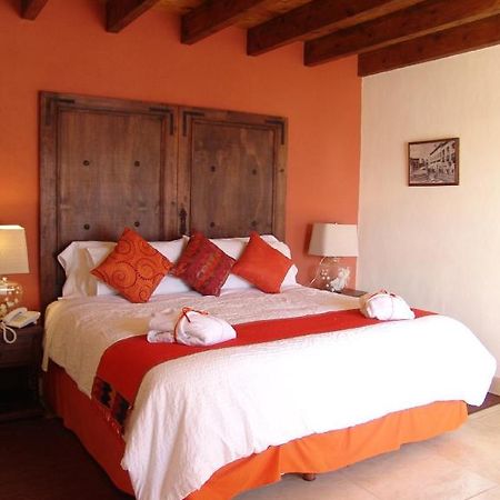 Casa Del Tio Hotel Boutique ซานมิเกล เด อาเญนเด ห้อง รูปภาพ A bedroom at Hotel San Cristóbal