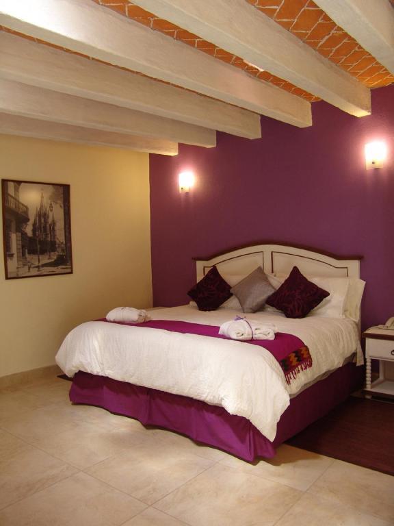 Casa Del Tio Hotel Boutique ซานมิเกล เด อาเญนเด ห้อง รูปภาพ A bedroom at the hotel