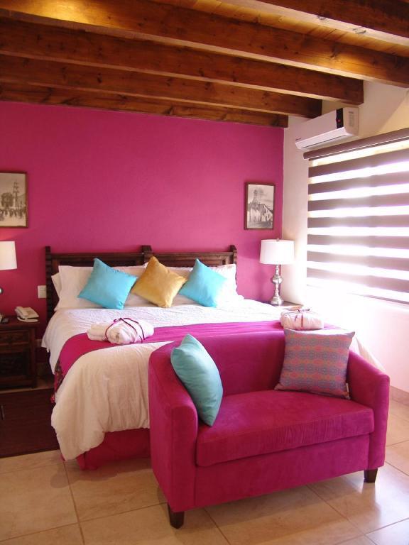 Casa Del Tio Hotel Boutique ซานมิเกล เด อาเญนเด ห้อง รูปภาพ A bedroom at the hotel