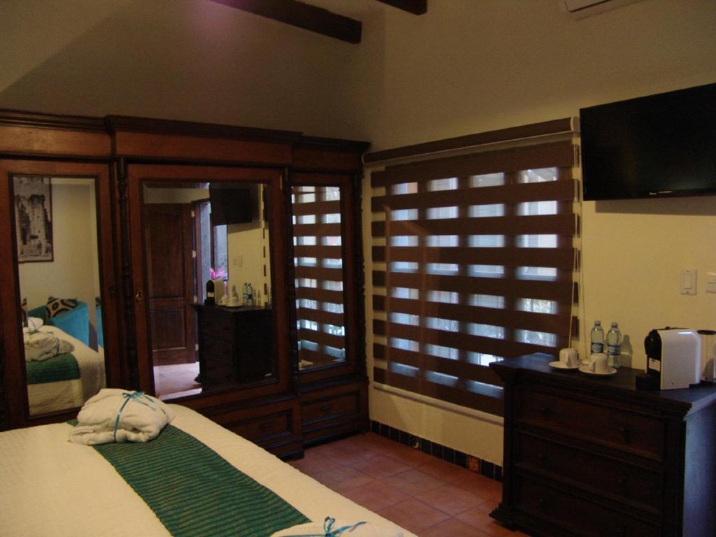 Casa Del Tio Hotel Boutique ซานมิเกล เด อาเญนเด ห้อง รูปภาพ A room at the resort