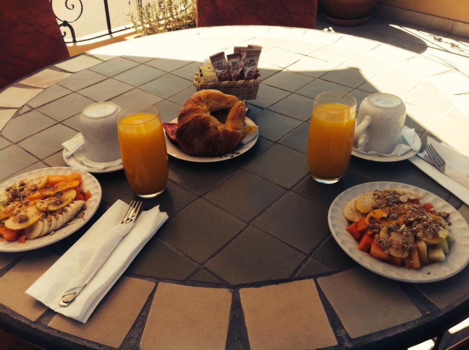 Casa Del Tio Hotel Boutique ซานมิเกล เด อาเญนเด ภายนอก รูปภาพ A typical breakfast